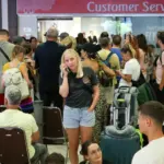 Flights cancelled as travel warnings issued after US-Israeli strikes on Iran