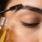 Daily castor oil care routine helps strengthen lashes and eyebrows naturally with consistent use