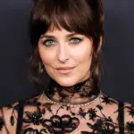 Dakota Johnson's “Flirty Little” Bangs Are Thanks to 6 Volumizing Growth Products Her Hairstylist Recommended I Try